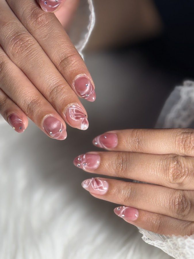 A manicure in progress at Pure Era Nails & Spa